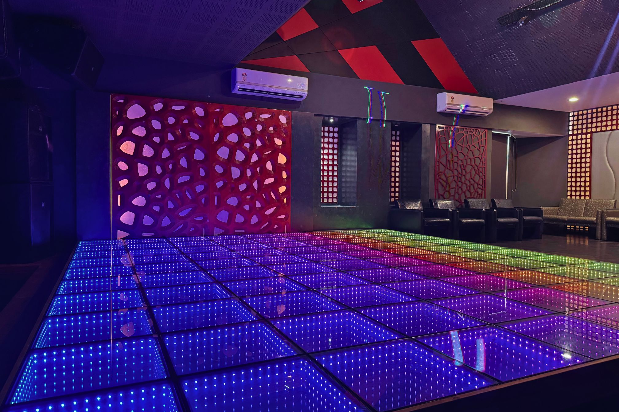 Modern disco room with light effects, perfect for private parties and music events near Ahmedabad