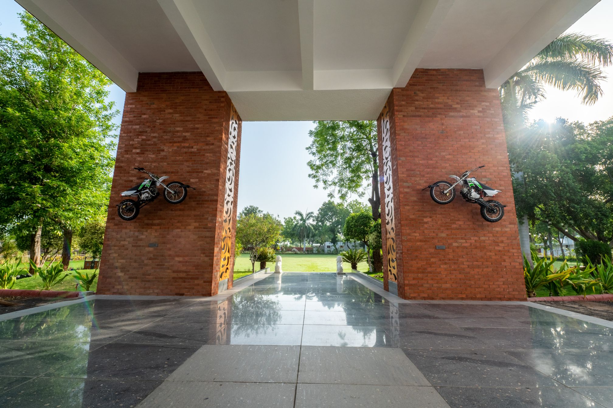 Motorbike-themed entrance arch offering a fun photo opportunity at Roadies Rostel one day outing resort