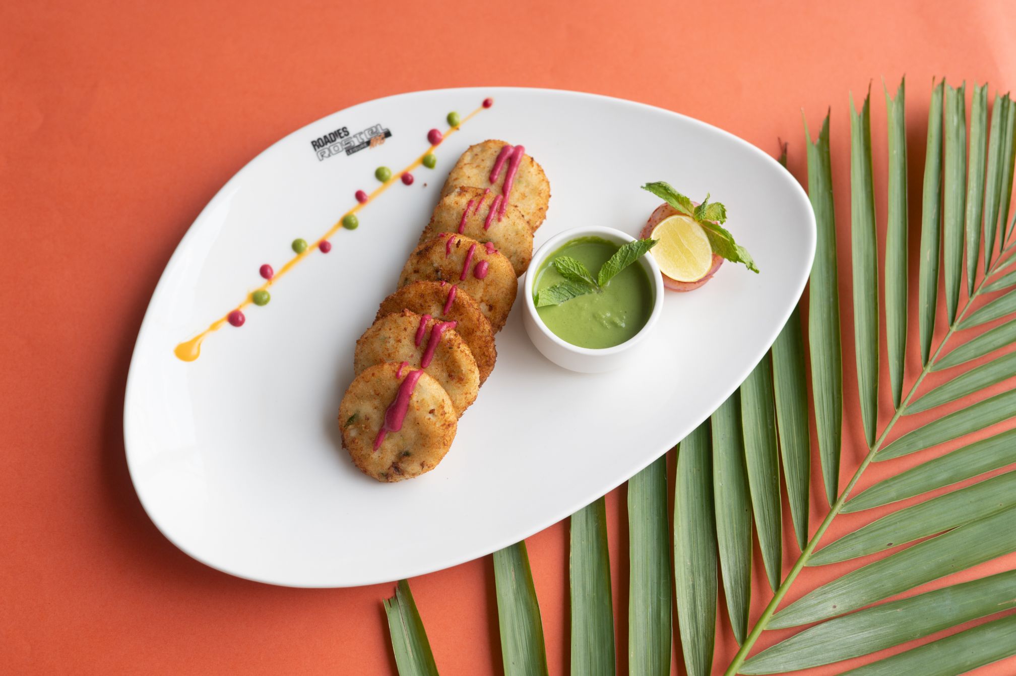 Sabudana tikki served with mint chutney, a flavorful vegetarian snack at Roadies Rostel one day outing