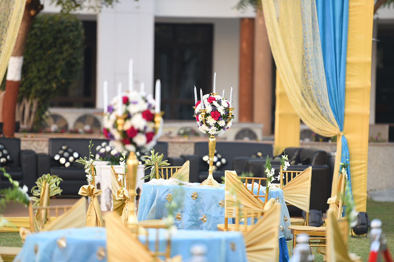 Decorated wedding buffet setup with floral accents at Roadies Rostel ARC Resort, ideal for luxury destination weddings near Ahmedabad.